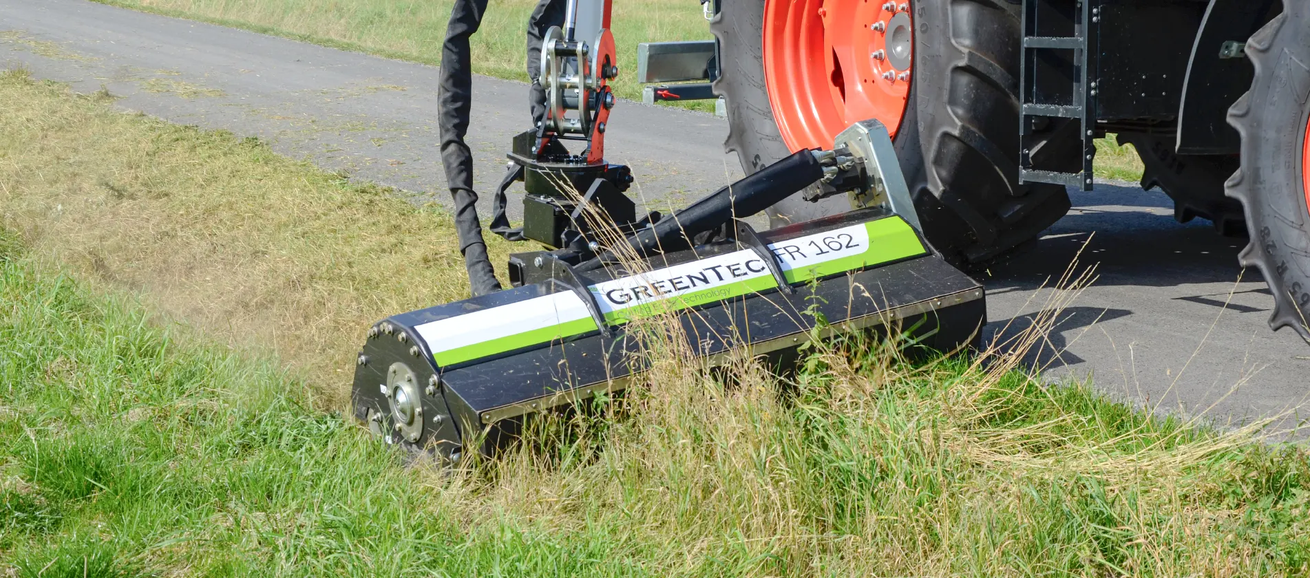 Hydraulic flail mower for maintenance of grass and shrubs