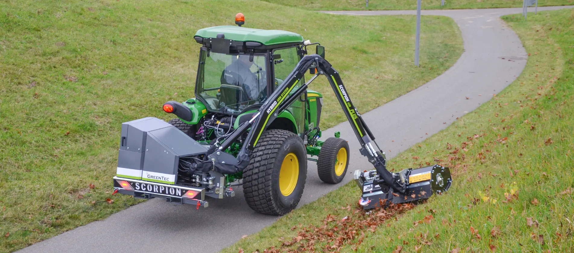 Maintenance of grass in verges with boom mower