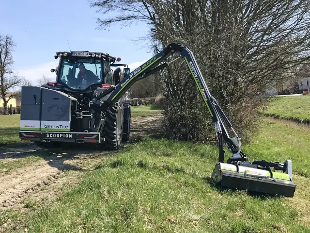 Long arm mower for maintenance of grass in ditches