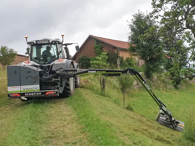 Tractor mounted boom mower