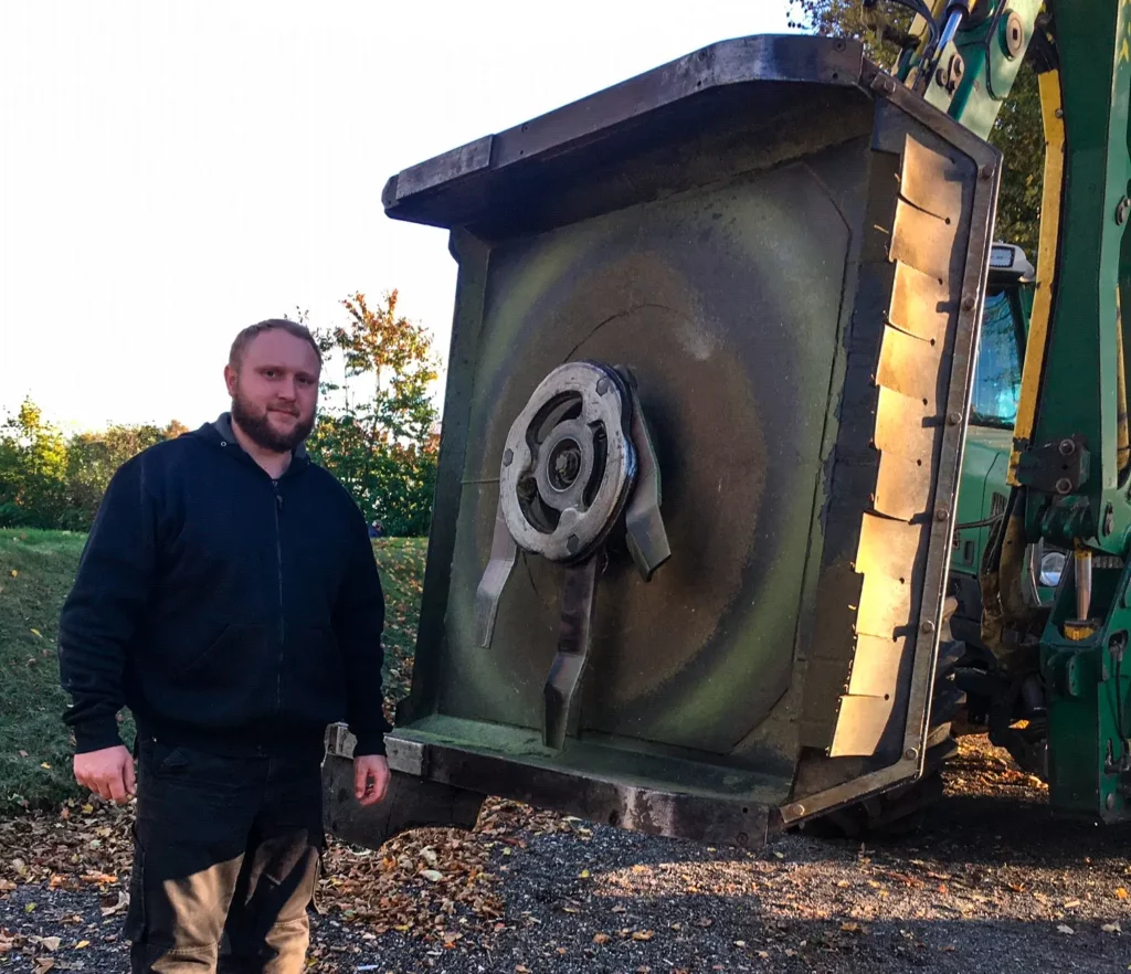 Michael Boldt Hansen standing next to his Rotary Crusher GT 135