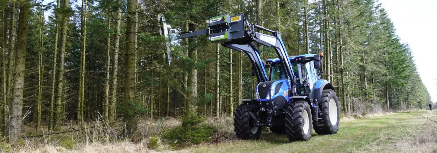 Tree trimmer attachment for front loader