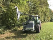 Tree trimmer attachment front mounted on tractor