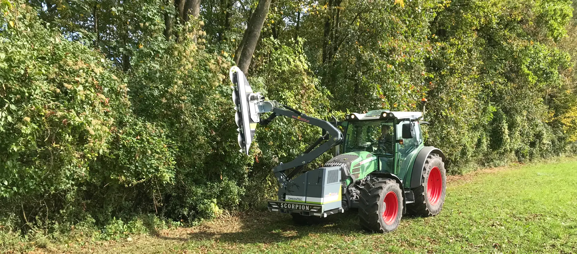 Tree trimming on field with GreenTec machines